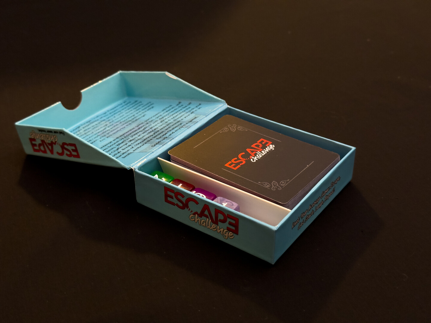Standard edition open showing cards and dice