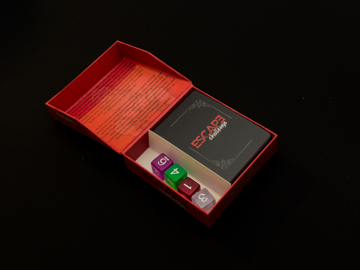 Red edition open showing cards and dice